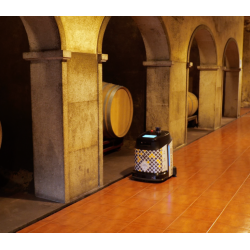 Robot nettoyeur de sol commercial Phantas Gausium 4-en-1 IA modèle 872157 nettoyant le sol d’une cave viticole entre des fûts